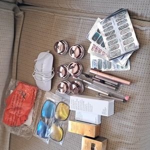 Grab bag.  Nails, polish, glasses,gloves for ua light,tools for sistaco, etc
